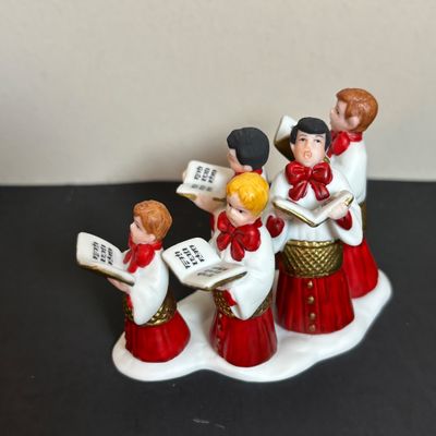 LOT 86: Dept 56 Heritage Village Collection: Choirboys All in a Row, Carolers on the Doorstep & Dickens Series Village Church &...