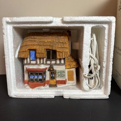 LOT 86: Dept 56 Heritage Village Collection: Choirboys All in a Row, Carolers on the Doorstep & Dickens Series Village Church &...