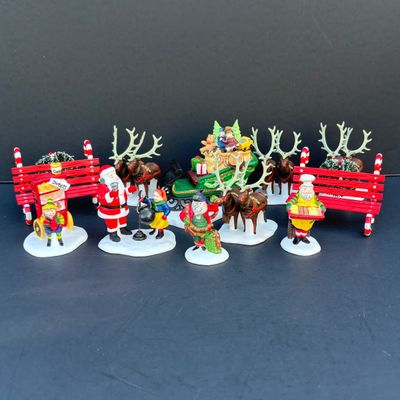 LOT 138: Department 56 Heritage Village Collection Christmas Figurines Lot with Boxes