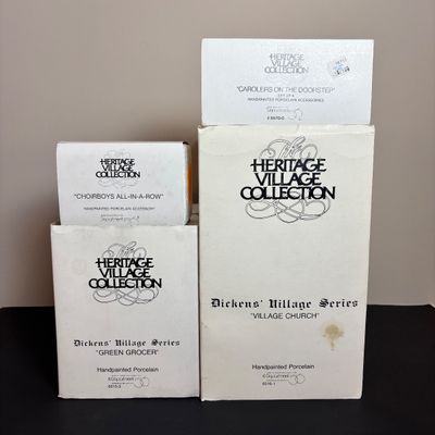 LOT 86: Dept 56 Heritage Village Collection: Choirboys All in a Row, Carolers on the Doorstep & Dickens Series Village Church &...