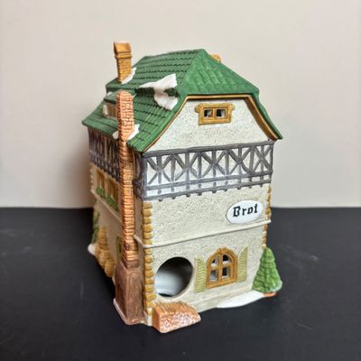 LOT 96: Dept 56 Alpine Village Series E. Staubr & Besson Bierkeller along with Porcelain Pine Tree