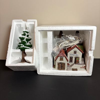 LOT 83: Dept 56 Heritage Village Collection Dickens Village Series: Village Church & Bishop Oast House & Village Porcelain Pine Tree