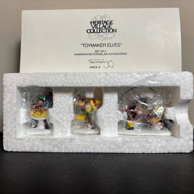 LOT 93: Dept 56 North Pole Series The Elf Spa & Heritage Collection Accessories: I'll Need More Toys, Baker Elves, Toy Maker...