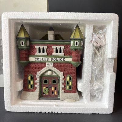 LOT 147: Dept 56 New England Series Old North Church & Captain's Cottage along with Dickens Series Coble Police Station