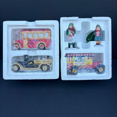LOT 136: Dept 56 Village Accessories: Delivering the Christmas Tree, One Horse Open Sleigh, All Around Town, Transport & Popcorn Vendor