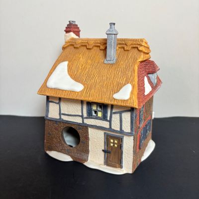 LOT 87: Dept 56 Dickens Village Houses w/Original Boxes: Leacock Poultry, Peggotty's Seaside Cottage, Betsy Trotwood's Cottage