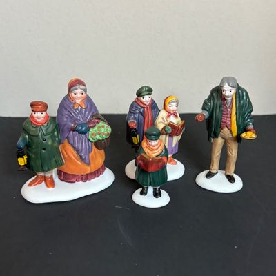 LOT 86: Dept 56 Heritage Village Collection: Choirboys All in a Row, Carolers on the Doorstep & Dickens Series Village Church &...