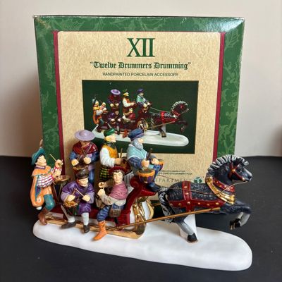 LOT 98: Dept 56 Twelve Says of Dickens Village: Eleven Lords A-Leaping, Seven Swans A-Swimming, Nine Ladies Dancing, Twelve Drummers...