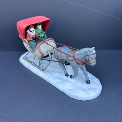 LOT 76: Dept 56 Accessories w/Original Boxes: Sing a Song for Santa, Carolers on the Doorstep, Violet Vendor- Chestnut Vendor-Carolers,...