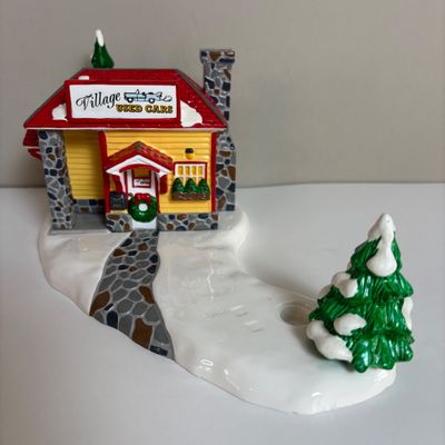 LOT 82: Dept 56 Snow Village Collection: Holly Brothers Garage, Pisa Pizza & Village Used Car Lot