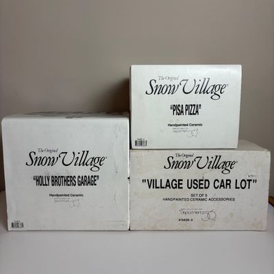 LOT 82: Dept 56 Snow Village Collection: Holly Brothers Garage, Pisa Pizza & Village Used Car Lot