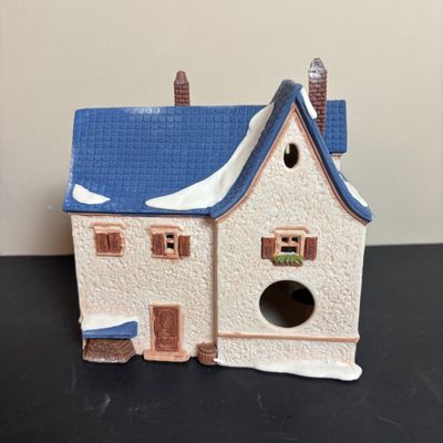 LOT 97: Dept 56 Alpine Village Series: Stoder Grist Mill, Apotek & Tabak along with a Village Porcelain Pine Tree
