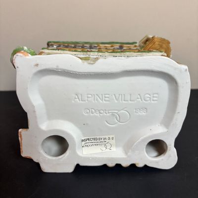 LOT 96: Dept 56 Alpine Village Series E. Staubr & Besson Bierkeller along with Porcelain Pine Tree