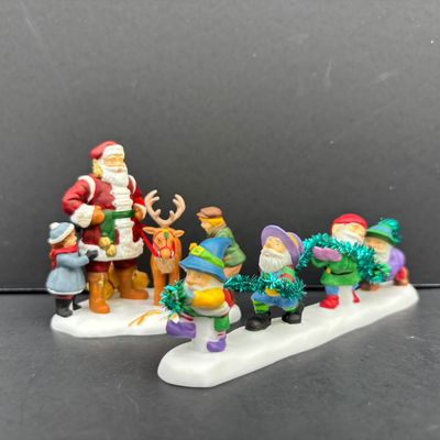 LOT 143: Village Accessories by Dept 56: Delivering Real Plastic Snow, Santa in the City, Elves on Track, Photo w/Santa, Tangles in...