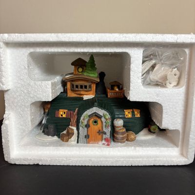 LOT 87: Dept 56 Dickens Village Houses w/Original Boxes: Leacock Poultry, Peggotty's Seaside Cottage, Betsy Trotwood's Cottage