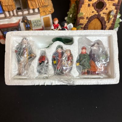 LOT 86: Dept 56 Heritage Village Collection: Choirboys All in a Row, Carolers on the Doorstep & Dickens Series Village Church &...