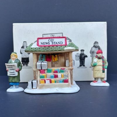 LOT 76: Dept 56 Accessories w/Original Boxes: Sing a Song for Santa, Carolers on the Doorstep, Violet Vendor- Chestnut Vendor-Carolers,...