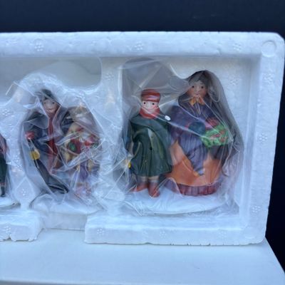 LOT 76: Dept 56 Accessories w/Original Boxes: Sing a Song for Santa, Carolers on the Doorstep, Violet Vendor- Chestnut Vendor-Carolers,...