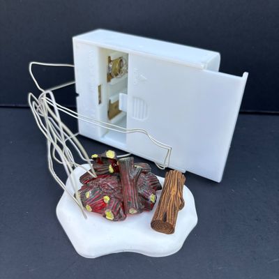 LOT 142: Village Accessories by Dept 56: Planning a Winter Vacation, Marshmallows Around the Campfire, Open Wide, Twinkling Lit Shrubs...
