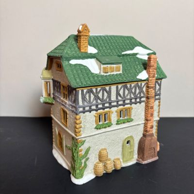 LOT 96: Dept 56 Alpine Village Series E. Staubr & Besson Bierkeller along with Porcelain Pine Tree
