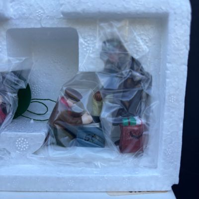 LOT 79: Dept 56 Accessories w/Original Boxes: Popcorn Vendor, Dickens' Carolers, Last Minute Delivery, All Around the Town,...