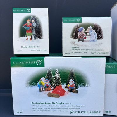 LOT 142: Village Accessories by Dept 56: Planning a Winter Vacation, Marshmallows Around the Campfire, Open Wide, Twinkling Lit Shrubs...