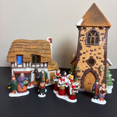 LOT 86: Dept 56 Heritage Village Collection: Choirboys All in a Row, Carolers on the Doorstep & Dickens Series Village Church &...