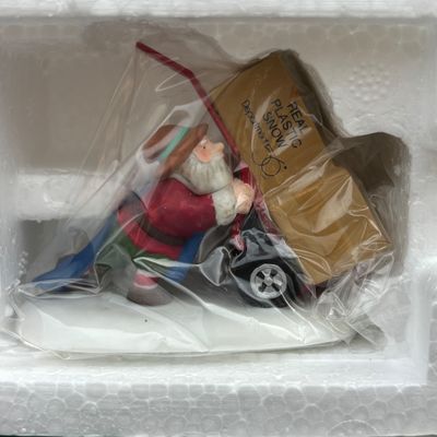 LOT 143: Village Accessories by Dept 56: Delivering Real Plastic Snow, Santa in the City, Elves on Track, Photo w/Santa, Tangles in...