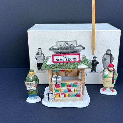 LOT 76: Dept 56 Accessories w/Original Boxes: Sing a Song for Santa, Carolers on the Doorstep, Violet Vendor- Chestnut Vendor-Carolers,...