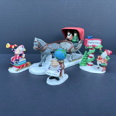 LOT 81: Dept 56 Accessories w/Original Boxes: Trimming the North Pole, Transport, Charting Santa's Course, Baker's Elves, One...