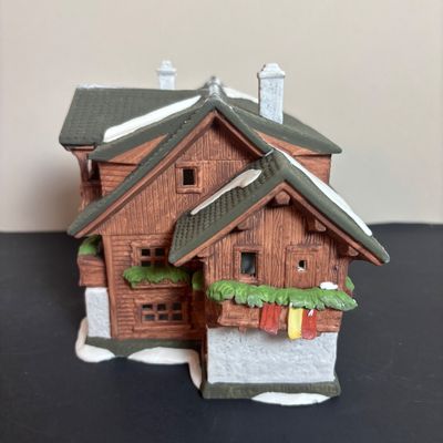 LOT 96: Dept 56 Alpine Village Series E. Staubr & Besson Bierkeller along with Porcelain Pine Tree