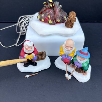 LOT 142: Village Accessories by Dept 56: Planning a Winter Vacation, Marshmallows Around the Campfire, Open Wide, Twinkling Lit Shrubs...