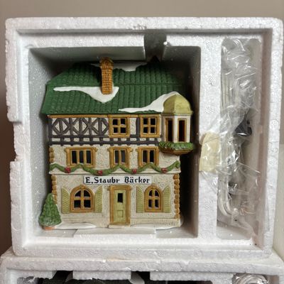 LOT 96: Dept 56 Alpine Village Series E. Staubr & Besson Bierkeller along with Porcelain Pine Tree