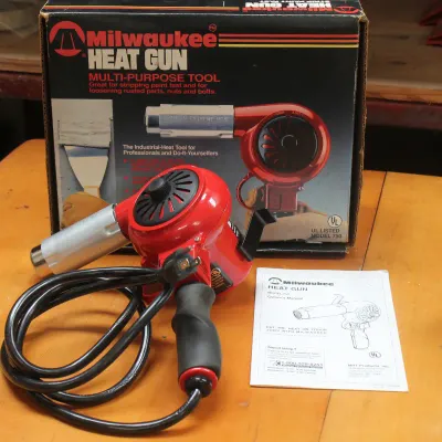 Vintage Milwaukee Model 750 multi-purpose heat gun, complete with its original box and owner's manual.
