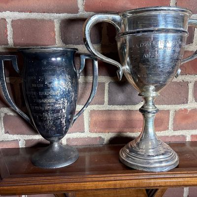 Two Sterling Silver Presentation Trophies for the University of Akron and Akron High School