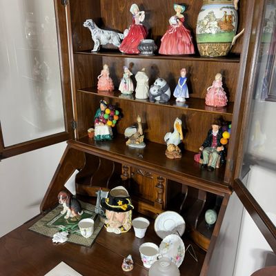 An Assortment of Royal Doulton and Doulton Burslem Porcelain and Ceramic Figurines and Decorative Wares