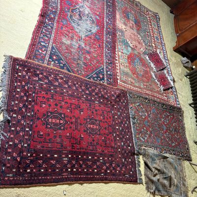 Seven Hand Knotted Persian and Tribal Rugs and Fragments