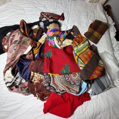An Assortment of Fashion Scarves and Wraps Including Perry Ellis and Smithsonian Institution