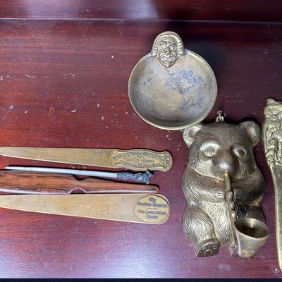 A Collection of Brass and Cast Metal Desk Accessories and Novelty Items