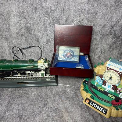 Three Lionel Licensed Novelty Items Including Locomotive Telephone Century Club II Kit and Animated Clock