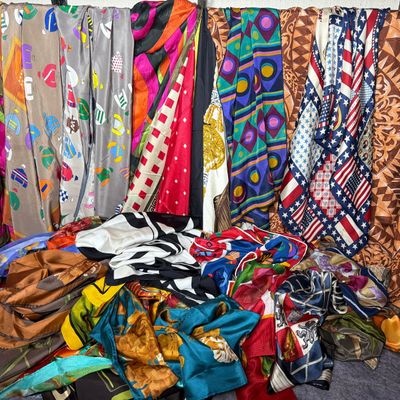 A Collection of Designer and Contemporary Fashion Scarves Including St. John, Oscar de la Renta, and Bill Blass