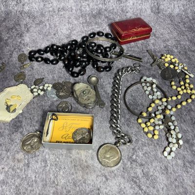 A Collection of Religious and Decorative Jewelry Including Sterling Silver and a 1964 Kennedy Half Dollar