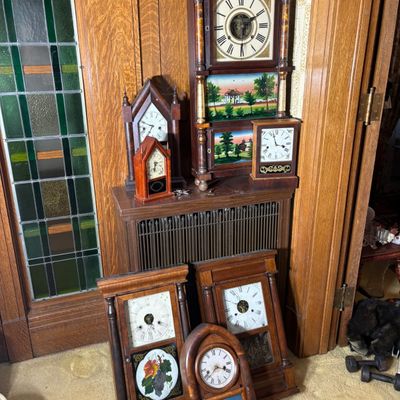 An Assortment of Antique American Mantel and Shelf Clocks including Steeple, Ogee, and Triple-Decker Forms