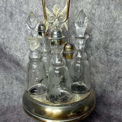 Victorian Five Bottle Silver Plated Rotating Caster Set