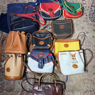 An Assortment of Vintage and Contemporary Dooney and Bourke Leather Handbags
