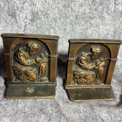 A Pair of Arts and Crafts Cast Bronze Cornucopia Relief Bookends