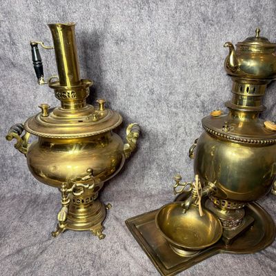 Two Brass Samovars with Accessories