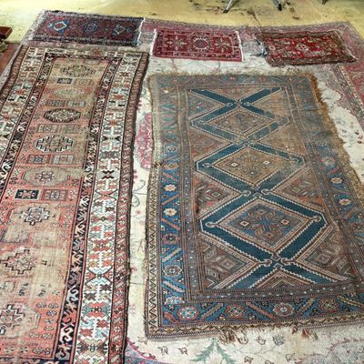 A Group of Six Hand Knotted Wool Persian and Tribal Rugs and Mats