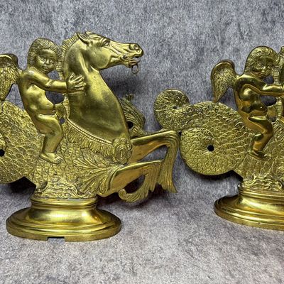 Pair of Brass Neoclassical Hippocampus and Putto Mantle Ornaments
