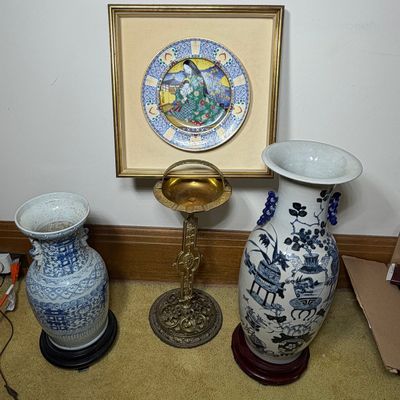A Collection of Asian Decorative Arts Including Two Blue and White Porcelain Vases A Commemorative Japanese Christmas Plate and a Brass...